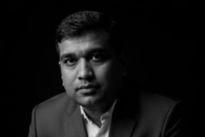 Ramesh Dixit, host of Project Insider Asia — black and white portrait